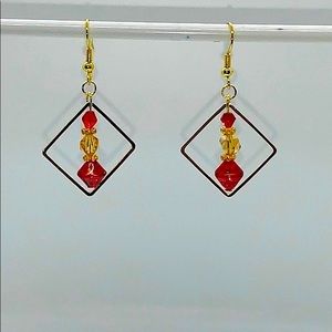 21052 Amber and red rhinestone earrings